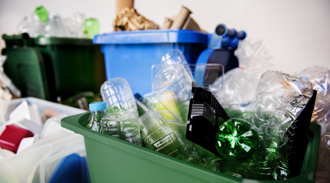 Recyclable Trash with Plastic Glass Bottles and Papers